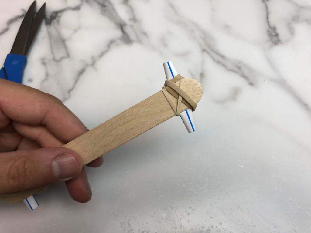 rubber band around edge to hold Mister C's kazoo together